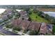 Luxury homes with tile roofs and solar panels at 10713 Berry Creek Rd, Orlando, FL 32836