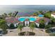 Resort-style pool and clubhouse with lake views at 10713 Berry Creek Rd, Orlando, FL 32836