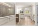 Spa-like bathroom with large shower and access to bedroom at 10713 Berry Creek Rd, Orlando, FL 32836