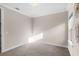 Spacious bedroom with neutral wall and carpet floor at 10713 Berry Creek Rd, Orlando, FL 32836