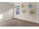 Well-lit bedroom, featuring a window and decorative wall art at 10713 Berry Creek Rd, Orlando, FL 32836