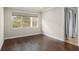 Spacious bedroom with hardwood floors and access to bathroom at 10713 Berry Creek Rd, Orlando, FL 32836