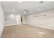 Spacious bonus room with carpeted floor and ceiling fan at 10713 Berry Creek Rd, Orlando, FL 32836