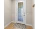 Interior entryway with a door featuring an elegant glass design at 10713 Berry Creek Rd, Orlando, FL 32836