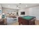 Game room featuring a pool table and comfortable seating at 10713 Berry Creek Rd, Orlando, FL 32836
