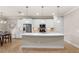 Modern kitchen with stainless steel appliances and an island at 10713 Berry Creek Rd, Orlando, FL 32836