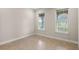 Bright office space with tile flooring and large windows at 10713 Berry Creek Rd, Orlando, FL 32836