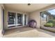 Spacious screened patio with brick pavers and grill at 10713 Berry Creek Rd, Orlando, FL 32836