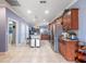 Modern kitchen featuring granite countertops and stainless steel appliances at 3570 Southern Cross Loop, Kissimmee, FL 34744