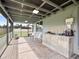 Covered patio with outdoor kitchen, perfect for entertaining at 3570 Southern Cross Loop, Kissimmee, FL 34744