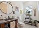 Stylish bathroom with concrete sink and plants at 3705 Ridge Run Dr, Minneola, FL 34715