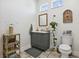 Bright bathroom with gray vanity, decorative tile, and ample natural light at 3705 Ridge Run Dr, Minneola, FL 34715