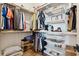 Well-organized closet with adjustable shelves, hanging space, and stylish storage at 3705 Ridge Run Dr, Minneola, FL 34715