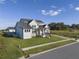A beautiful house with well-manicured lawn and landscaping on a sunny day at 3705 Ridge Run Dr, Minneola, FL 34715