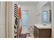 Clean bathroom with shower, toilet and vanity at 4213 Seybold Ave, Orlando, FL 32808