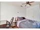Bedroom with ceiling fan, double bed and a desk at 4213 Seybold Ave, Orlando, FL 32808
