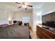 Comfortable bedroom with a large bed and plenty of storage at 4213 Seybold Ave, Orlando, FL 32808