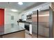 Modern kitchen with stainless steel appliances and granite countertops at 4213 Seybold Ave, Orlando, FL 32808