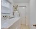 Laundry room with washer, dryer, and extra storage at 4213 Seybold Ave, Orlando, FL 32808