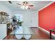 Living room with hardwood floors, a couch, and a glass coffee table at 4213 Seybold Ave, Orlando, FL 32808