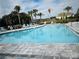 Community pool with plenty of lounge chairs at 4421 Lions Gate Ave, Clermont, FL 34711