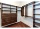 Large walk-in closet offers custom shelving and hanging space at 5049 Lake Howell Rd, Winter Park, FL 32792