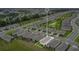 Wide aerial perspective of a housing development, highlighting uniform architecture and landscaping at 7836 June Ln, Wildwood, FL 34785