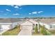 Charming single-Gathering home with a well-manicured lawn and inviting curb appeal in a Gathering-friendly neighborhood at 7836 June Ln, Wildwood, FL 34785