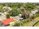 Housetop view of a single Gathering home with a red roof nearby at 825 Kottle S Cir, Daytona Beach, FL 32114