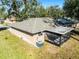 Brick home with screened patio and backyard at 825 Kottle S Cir, Daytona Beach, FL 32114