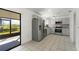 Kitchen with stainless steel appliances and grey cabinets at 825 Kottle S Cir, Daytona Beach, FL 32114