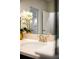 Close-up of a bathroom vanity featuring white countertops, brushed nickel hardware, and modern fixtures at 1219 Verdant Glade Pl, Winter Park, FL 32792