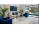 Comfortable living room with elegant furnishings, bright light and a view of the patio at 1219 Verdant Glade Pl, Winter Park, FL 32792