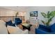 Cozy loft space with a sofa, armchairs, and a coffee table with natural light at 1219 Verdant Glade Pl, Winter Park, FL 32792