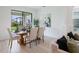 Beautiful dining room with elegant seating, modern lighting, and open floor plan to other rooms at 1312 Blue Stem Ln, Winter Park, FL 32792