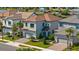 Charming two-story home with a two-car garage, paved driveway and landscaped front yard at 1312 Blue Stem Ln, Winter Park, FL 32792