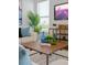 Living room with natural light, modern furnishings, and decorative accents create a welcoming atmosphere at 1312 Blue Stem Ln, Winter Park, FL 32792