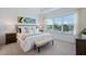 Inviting bedroom with large window, natural light, and stylish decor at 1312 Blue Stem Ln, Winter Park, FL 32792