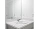 Bathroom featuring a white sink, quartz countertop, and modern fixtures at 142 Jones Fish Camp Rd, Edgewater, FL 32141