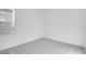 Empty bedroom with carpeted floors and a window with blinds at 142 Jones Fish Camp Rd, Edgewater, FL 32141