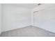Neutral bedroom with carpet and a sliding-door closet at 142 Jones Fish Camp Rd, Edgewater, FL 32141