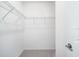 Walk-in closet with rod and shelving at 142 Jones Fish Camp Rd, Edgewater, FL 32141
