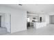 Open-concept living area next to the kitchen and dining area, perfect for entertaining at 142 Jones Fish Camp Rd, Edgewater, FL 32141
