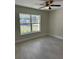 Bedroom with a view of the front yard at 1629 Pear Ave, Sanford, FL 32771