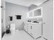 Modern bathroom with double vanity, walk-in shower, and toilet at 304 E South St # 5029, Orlando, FL 32801