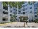 Modern building exterior with gated entrance at 304 E South St # 5029, Orlando, FL 32801