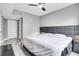 Main bedroom with gray walls, king-size bed, and ample closet space at 304 E South St # 5029, Orlando, FL 32801