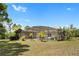 Expansive backyard with large screened in patio area perfect for entertaining and relaxing at 3871 Dallas Blvd, Orlando, FL 32833