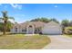 Charming single-story home with manicured lawn, inviting entrance, and two-car garage in a desirable location at 3871 Dallas Blvd, Orlando, FL 32833