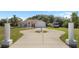 Beautiful single-story home featuring a circular driveway, manicured lawn, and RV parking at 3871 Dallas Blvd, Orlando, FL 32833
